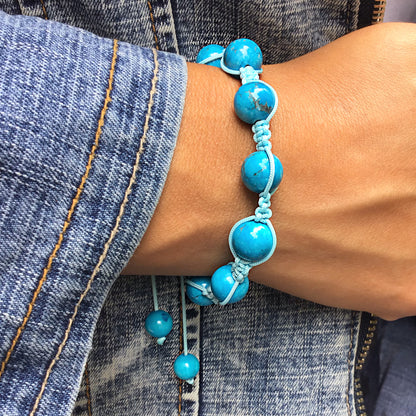 Pulsera turquesa bolas 8mm con macrame