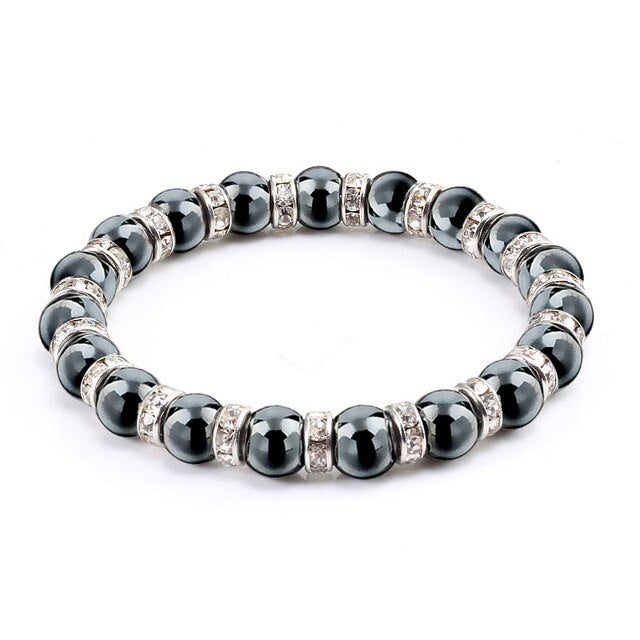 Pulsera hematite bolas 8mm con dijes