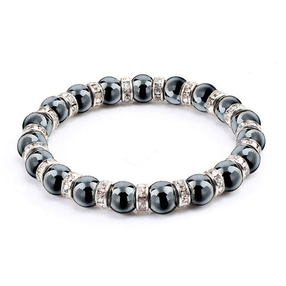 Pulsera hematite bolas 8mm con dijes